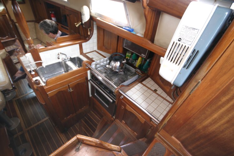 Bruce Roberts 34 Sailing Yachtfor sale Looking down the Companionway Steps. - View of galley.