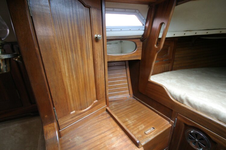 Bruce Roberts 34 Sailing Yachtfor sale Port Side Forward Cabin. - Storage locker and hidden heads unit.