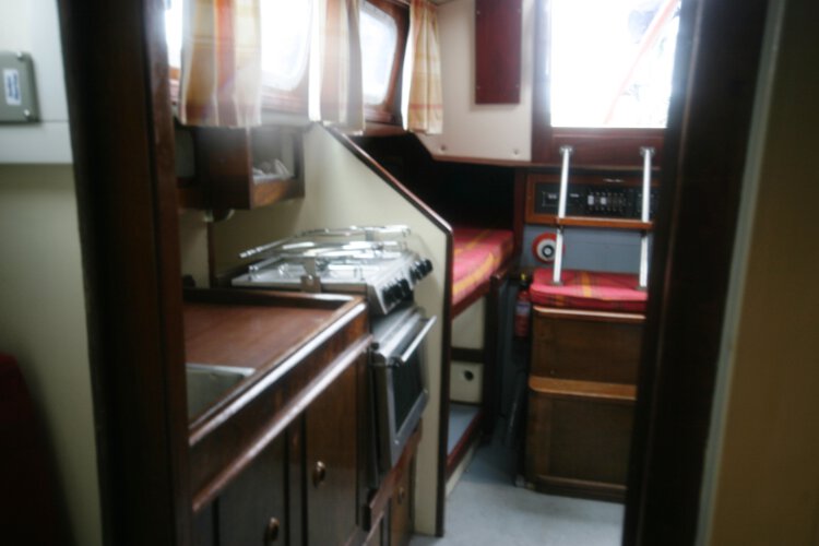Morgan Giles for sale The view from the fore cabin - Looking aft into the saloon with the galley on the left