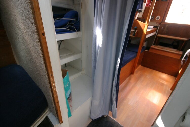 Colvic Springtide 25for sale Hanging locker to starboard - as seen from the forward cabin entrance