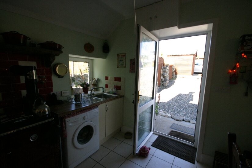 Western Isles Property -  House on the Isle of Lewisfor sale Main Entrance into Kitchen - Door open with view onto side front drive
