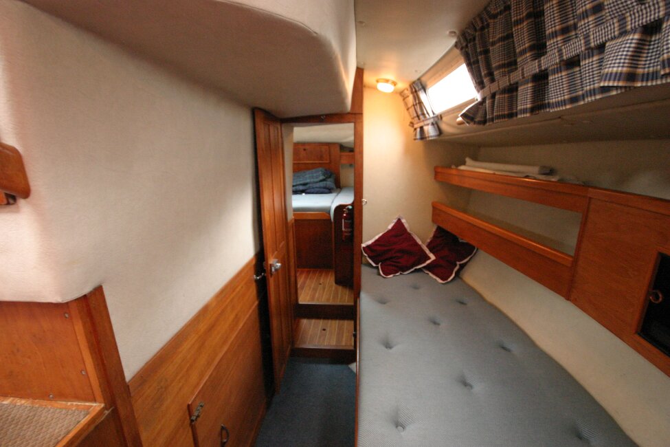 Westerly Corsair Mk 1for sale Looking towards aft cabin entrance - Good storage and single pilot berth.
