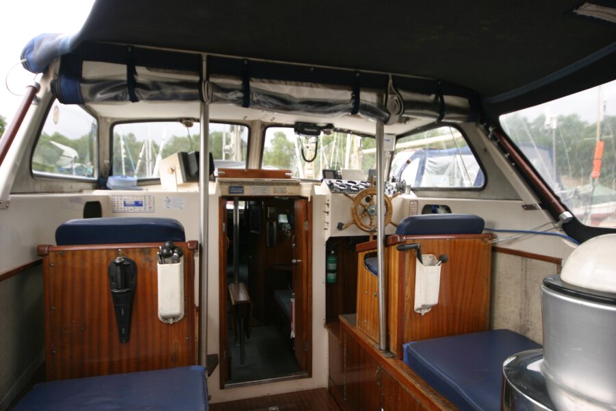 Finnsailer 35ft Motor Sailerfor sale View forward from the cockpit - Wheelhouse helm to starboard, companionway centre and crew seat to port 