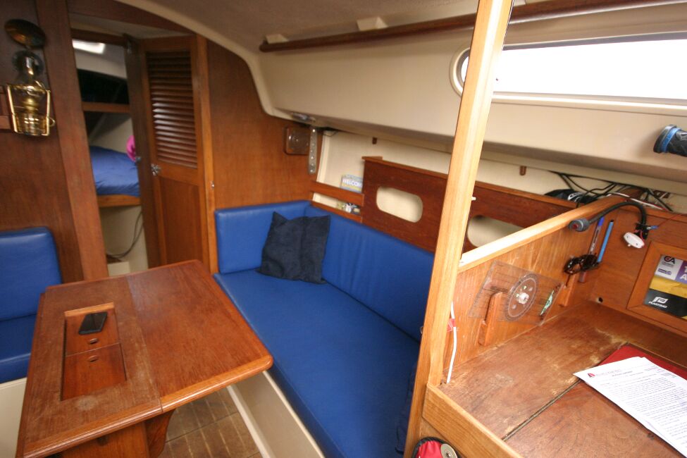 Sadler 29for sale Saloon Dining Table - Starboard.
Passageway to heads, hanging locker and forward cabin can be seen.