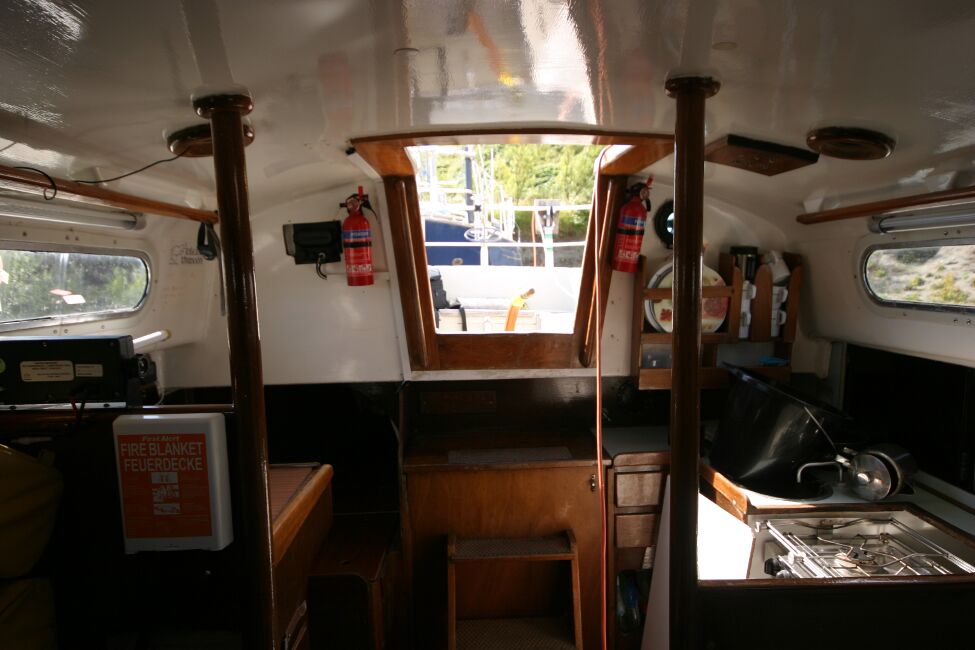 Contessa 32for sale View from forward in the saloon, aft to companionway - Quarter berth on starboard side