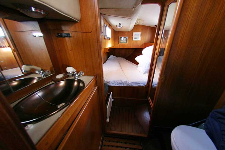 Jeanneau Trinidad 48 Ketchfor sale Port aft cabin - with heads in the foreground