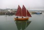 Wooden Classic Orkney Yawl Seen from the shore