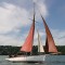 Classic Victorian gentlemans yacht Sailing by